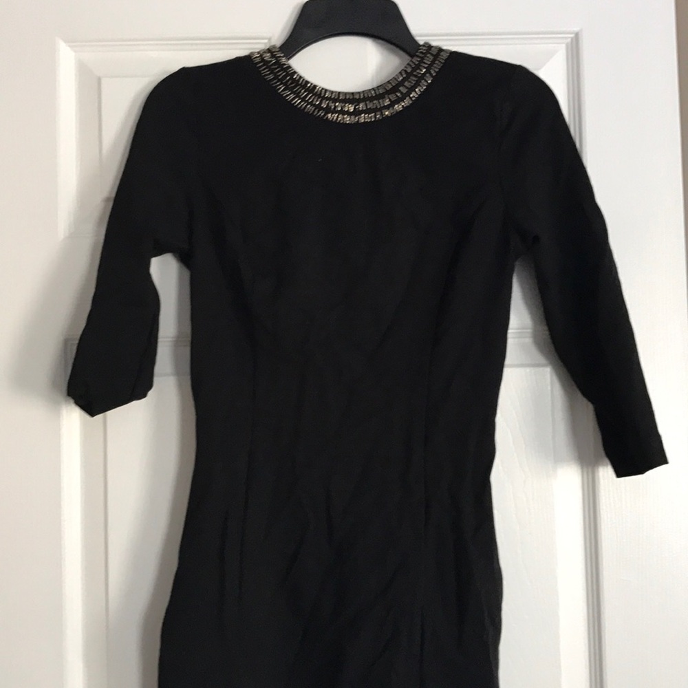 Black tight body con dress